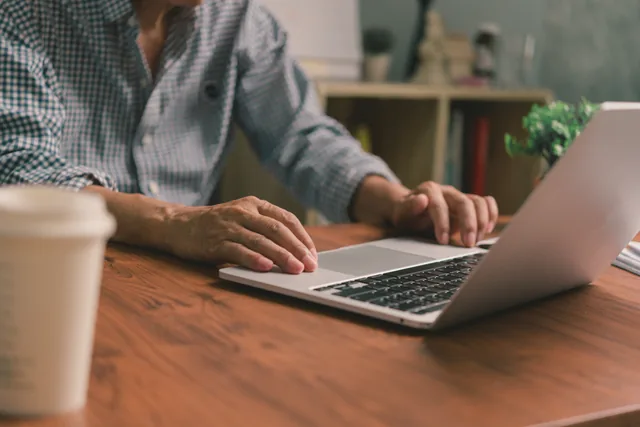 Businessperson using a laptop