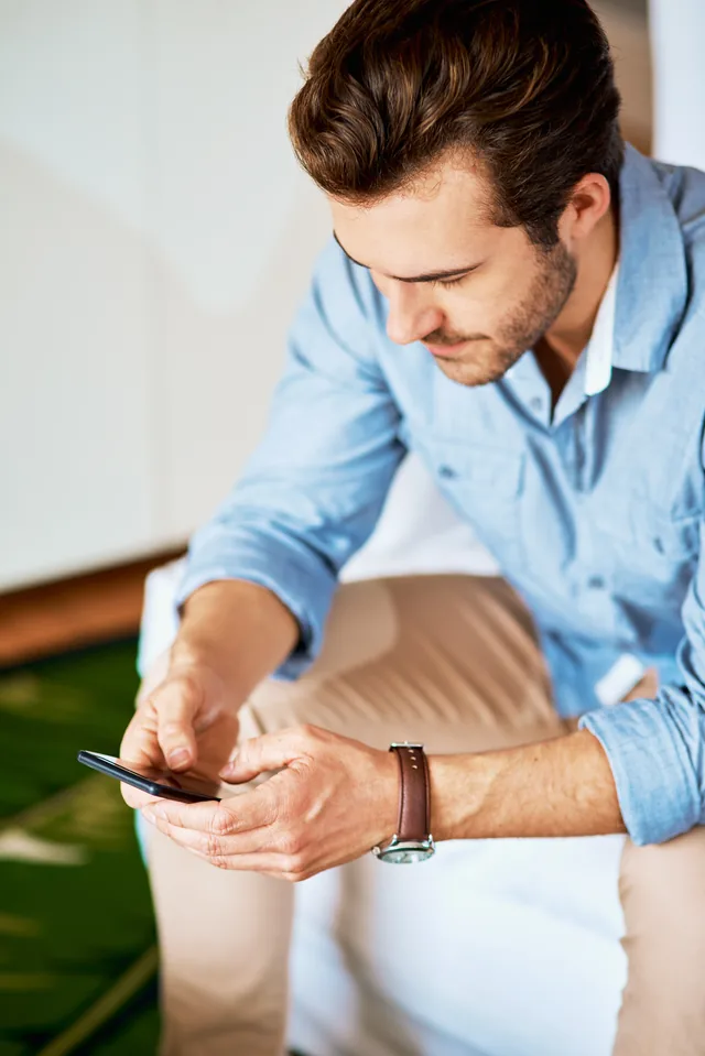Creator reviewing content performance on a phone