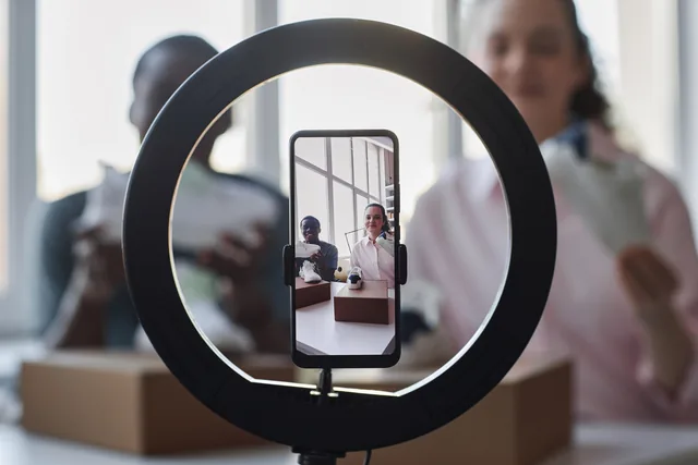 Creators filming product content on a smartphone