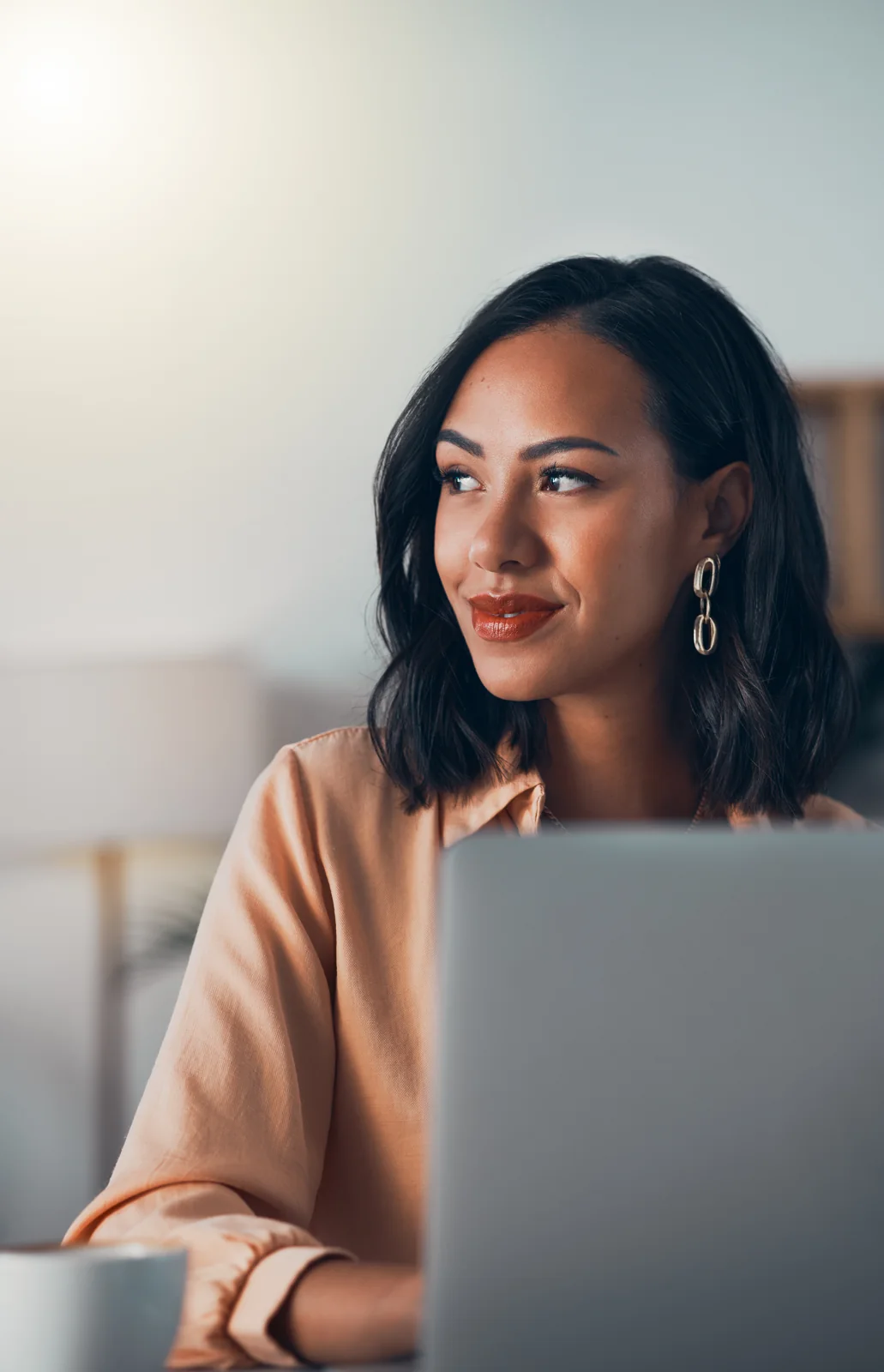 A businesswoman working on her laptop