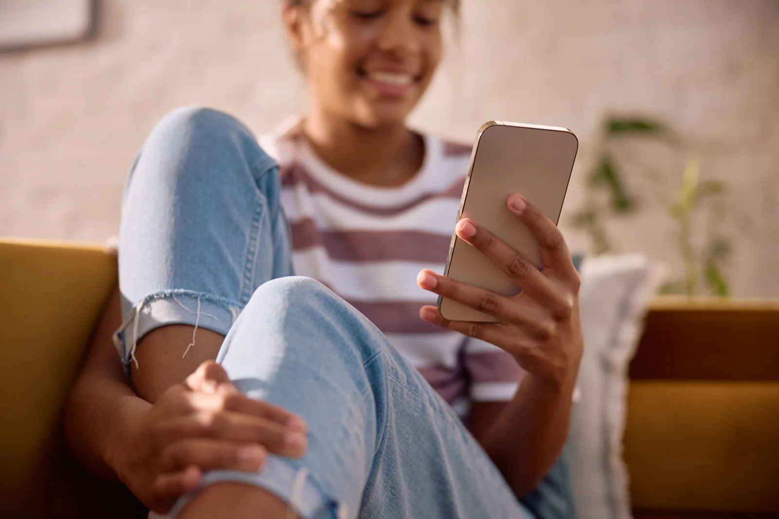 A woman enjoying content on her phone